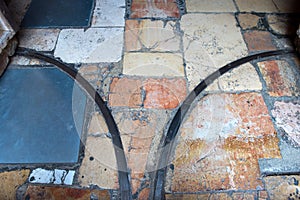 Stone pavement and entrance door rails in the Church of the Holy Sepulchre, Jerusalem, Israel