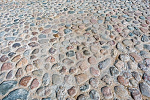 Stone pavement texture. Cobblestone pavement. Cobbles texture - hard pavement, a kind of pavement.