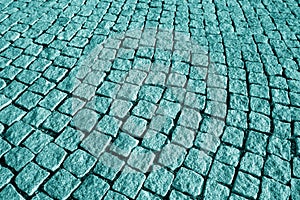 Stone pavement texture in cyan tone