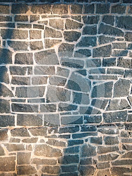Stone pavement texture. Granite cobblestoned background backdrop