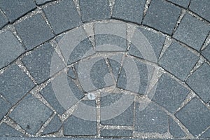 Stone pavement texture, granite cobblestoned pavement background, cobbled stone road regular shapes, abstract background of old