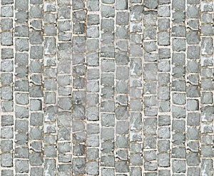 Stone pavement texture. Granite cobblestoned pavement background. Abstract background of old cobblestone pavement close-up. Seamle