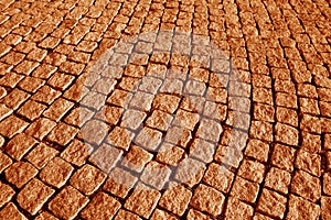 Stone pavement texture in orange tone