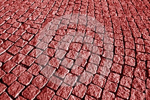 Stone pavement texture in red tone