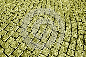 Stone pavement texture in yellow tone