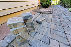Stone Pavers and Tools for Side Yard Hardscape photo