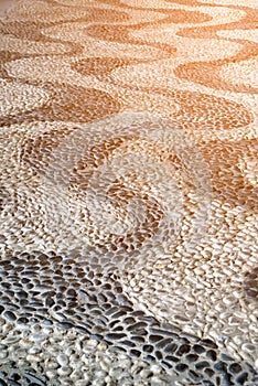 Stone paving background - granite cobblestone pattern in Thailand.