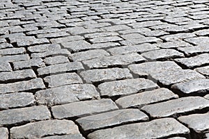 Stone paving texture. Abstract old pavement background.