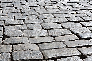 Stone paving texture. Abstract old pavement background.