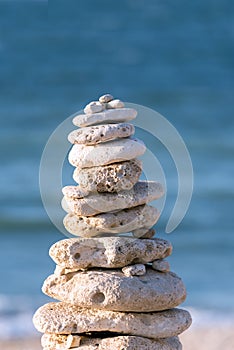 Stone and pebbles on ocean background