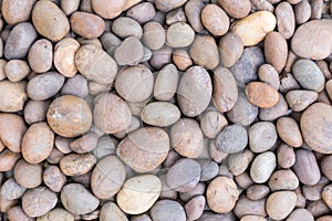 Stone pebbles texture background for interior exterior decoration and industrial construction concept design