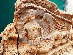 Stone pediment featuring a siren from over an Etruscan tomb entrance