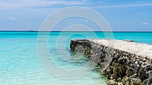 Stone pier under the blue sky, Maldives.