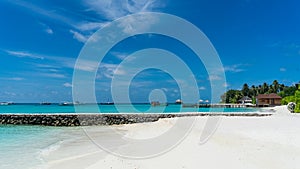 Stone pier under the blue sky, Maldives.