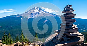 Stone pile in front of distant Mt Hood