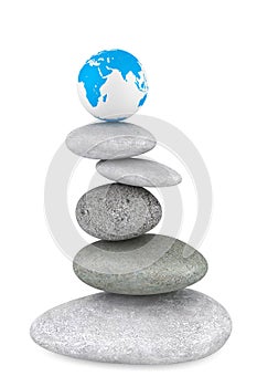 Stone pile in a Zen Garden with a Earth globe