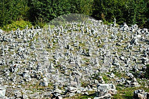 Stone piles cairns in the Ruskeala Mountain Park, Karelia, Russia