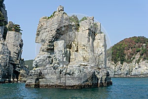 Stone pillar emerged from the sea is the part of Geoje Haegeumgang rock islands