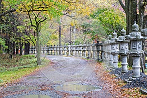 Stone pillar lanterns pathway near Lake Yunoko in Autumn, in Nikko