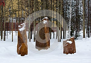 Stone pillars in the Geologists \' Square in the city of Noyabrsk in winter