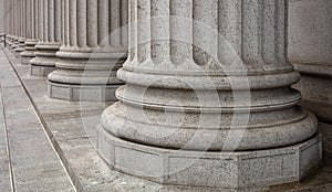 Stone pillars row and stairs detail. Classical building facade