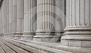 Stone pillars row and stairs detail. Classical building facade