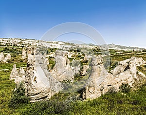 Stone pillars in the valley of the Goreme National Park. Cappadocia.