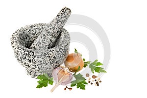 Stone pounder with spices on a white background photo