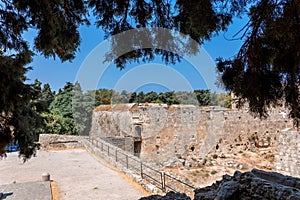 Stone powerful walls of old city, the ancient defense of Old Town, Rhodes, Dodecanese, Greece.