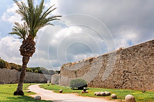 Stone powerful walls of old city, the ancient defense of Old Town, Rhodes, Dodecanese, Greece.