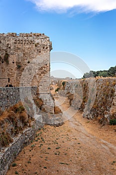 Stone powerful walls of old city, the ancient defense of Old Town, Rhodes, Dodecanese, Greece.