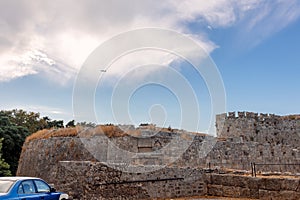 Stone powerful walls of old city, the ancient defense of Old Town, Rhodes, Dodecanese, Greece.