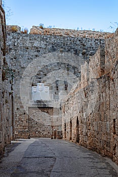 Stone powerful walls of old city, the ancient defense of Old Town, Rhodes, Dodecanese, Greece.