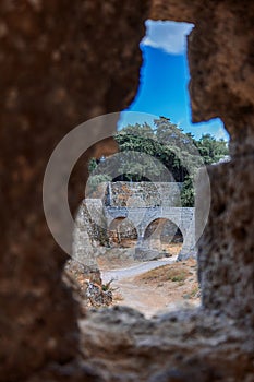 Stone powerful walls of old city, the ancient defense of Old Town, Rhodes, Dodecanese, Greece.