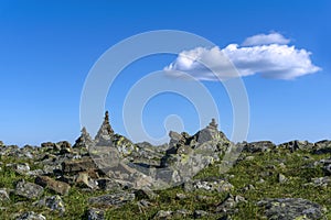 Stone pyramids on a mountain plateau