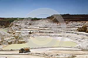 Stone quarry with excavate photo