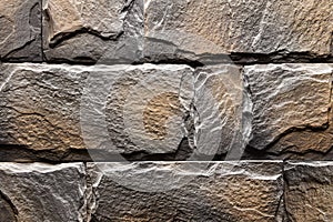 Grey orange Stone wall texture background natural color