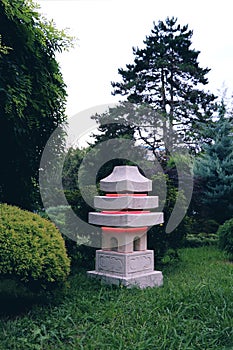 Stone red lantern in japanese garden