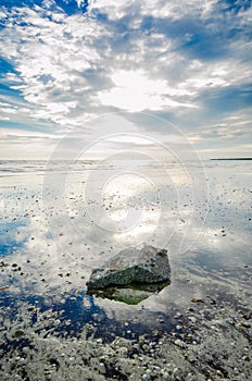 Stone reflection on beach