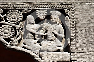 Stone relief in Patan's Durbar square photo