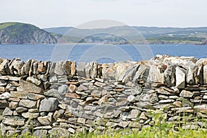 Stone retaining wall by the ocean