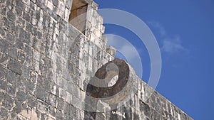 A stone Rind on a wall of Ancient field for Mayan Ball Game in Chichen Itza, Yukatan, Mexico.