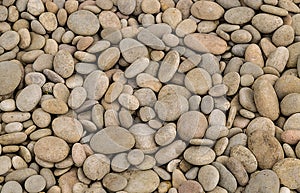 Stone river pebble beige gray natural background