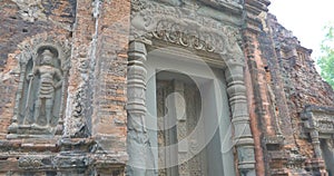 Stone rock carving art ruins in Preah Ko temple in Roluos Angkor Wat complex, Siem Reap Cambodia