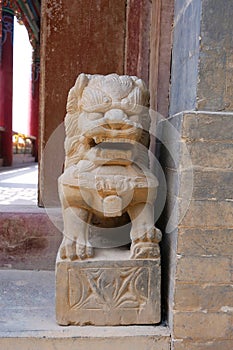 Stone rock lion statue in Tulou Temple of Beishan Mountain, Yongxing Temple in Xining Qinghai China