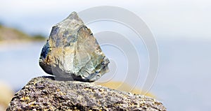 Stone on a rock near seashore in Norway