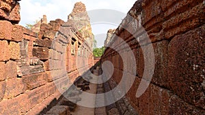 Stone rock wall at Ancient buddhist khmer temple architecture ruin of Pre Rup in Angkor Wat complex, Siem Reap Cambodia