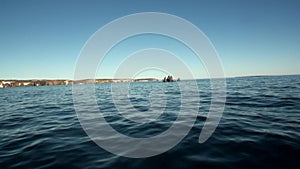 Stone rocks among the watery surface of Arctic Ocean on New Earth.