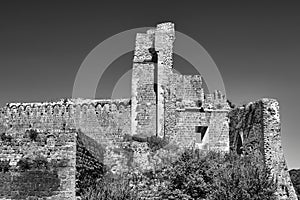 Stone ruins of an ancient castle in the town of Sovana