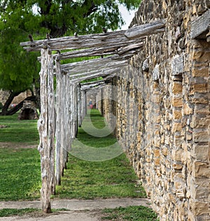 Stone ruins with timber frame front porch